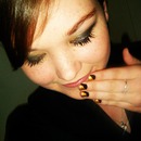 black smokey with golden touch. gold and black taped nails