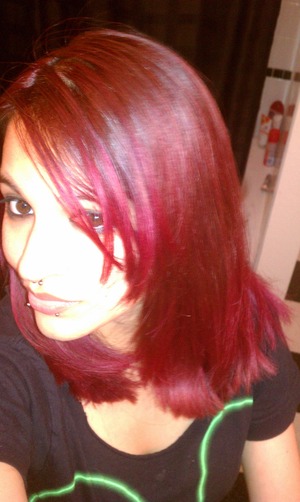 Mixture of Revlon red hair dye, & Manic Panic hot hot pink.! 