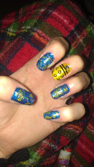 My nail art version of the Dr. Who exploding TARDIS and a dalek added for good measure. 