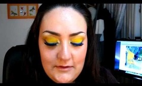 Yellow Van Gogh with Dramatic Blue Liner Makeup Look