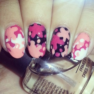 Pink splatter nail art