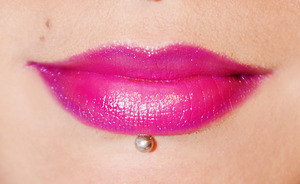 I outlined my lips with a glittery hot pink sephora lip liner pencil. Then I shaded in a hot pink lipstick and filled the center with a vibrant bright pink. I then re outlined my lips with purple lip stick applied with a lip brush. 