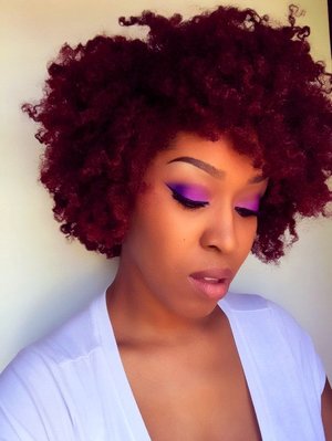 🍆EggPlant: This dope cut crease and fro is my look for the day. I began with @simpleskincare protecting lightweight moisturizer, @elfcosmetics Poreless Face Primer. So I always start off filling in my brows to frame my face using @essence_cosmetics brown brow pencil and @maccosmetics eye pencil in Coffee. @nyxcosmetics eyeshadow primer in vivid white, @bhcosmetics 1st & 2nd 120 eyeshadow palette , gel eyeliner in Onyx. @maccosmetics NC45 Concealer, foundation, and powder, lipstick in High Tea, and blush in Raizin, Used all @realtechniques brushes on this entire look. HAIR:@cantubeauty Coconut Curling Cream to soften my hair and then put half up in a puff and fluffed out the back💋