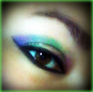 i was trying to just do rainbow eyeliner, but it turned into more than that... this is what i ended up with. 