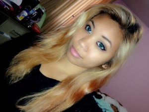 blonde hair with turquoise contacts 