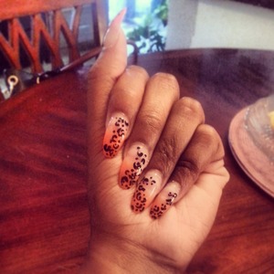 A little Cheetah fun. Products used were Koo Koo Cachoo by Color Club, Art Deco Black, and Seche Vite top coat.