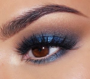 The Look: Vibrant, metallic blue lids, set in a soft wash of warm smokey shadows. Brows are structured, yet soft, to bring balance and harmony. Full spiky lashes complete the look.

Products Used (EYES):
NYX Cosmetics Dream Catcher "Golden Horizons" Palette (crease, blending, transition shades)
NYX Cosmetics Jumbo Eye Pencil in Black Bean (used as base)
NYX Cosmetics Baked Eyeshadows in:
Indigo Child (applied wet to the center of the lid and lower lash line)
Blue Dream (applied wet to the lid and lower lash line)
LASHES: House of Lashes "Iconic" 

Tried to get as close as I could with the products used. 

Photo creds: Maryam. 