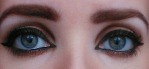 tried to do natural colours but applied a black winged eyeliner , to add a night time look 