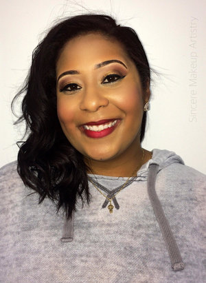 There's nothing better than a classic red lip. I went for a warm  gold eye shadow and to help intensify her big brown eyes and of course paired it with bold red  on the lips.
