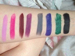 Just a low quality iPhone photo 
From left to right : darling, shady lady, 6six6, by starlight, space cake, DGAF, blow, bane. 
Each lipstick was swiped across once except blow (green) had to be swiped twice to get a good opacity. 
