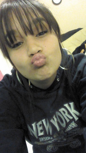 Messy bun,  straight bangs & mascara
<3