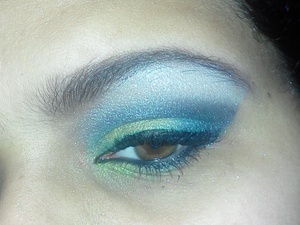 A blue and lime-gold colored eye look inspired by Bring It On and used for a photo shoot hosted by a student and personal friend of mine at The Paul Mitchel School of Beauty in Bear, DE.
