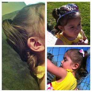 I dolled up her hair today with curled pigtails!