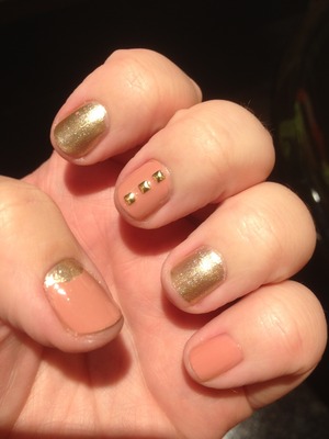 I used ulta lacquer in high roller. The studs are from the born pretty store. :D