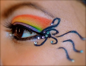 ARTZY cuRLy
(don't mind my eyebrow :p )
re-d0ne my rainbow look. but i added some baby rhinestones and gel liner.