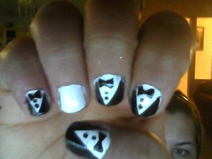 This is my attempt at tuxedo nails.. not that well done but that's okay =) 