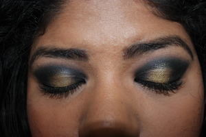 Watch my tutorial here: http://www.youtube.com/watch?v=n_qA0BcPnZQ

Other products:
Rimmel Scandaleyes Waterproof Kohl Kajal Eyeliner in Black
Elf 10 Piece Party Beauty Book(Gold and Black Eyeshadow)
Physicians Formula Eyeshadow Duo in Taupe Minerals
Coty Airspun Frangrance Free Loose Powder in Translucent
Jordana Lip Gloss in Clear
Wet n Wild Bronzer in Reserve Your Cabana