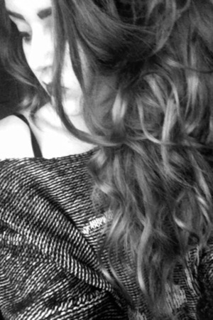 Curled hair with 3/4" tongs night before then bundled up into a messy bun over night, woke up with extra volume and pretty curls.