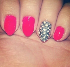 Red nails with silver accent nail 