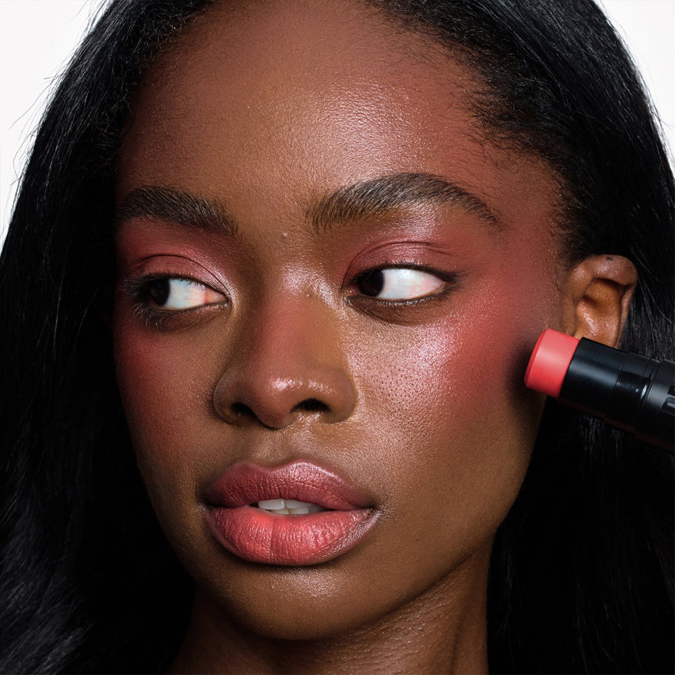 Nudestix model wearing the Nudies Bloom in Poppy Girl