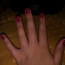 Pink and black polka dot nail