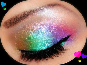 Rainbow eyes made using UD Deluxe shadow box palette
Picture Tutorial At:  http://chelliglamvixen.blogspot.com/2011/04/urban-decay-deluxe-shadow-box-candy.html