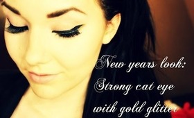 New Years Makeuplook: Bold cateye with goldglitter