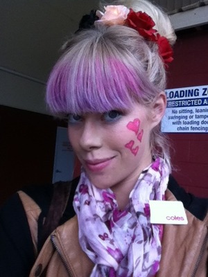 Pink/purple fringe, roses in the quick updo and love hearts on my cheeks!! Love hearts were Rimmel Kate Moss lipstick in 111 and 107 with a spray of joico strong lacquer hairspray to keep put :) 