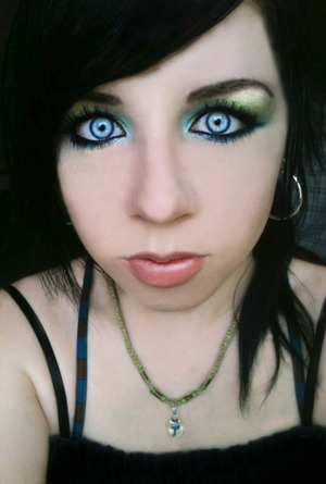 My sister photoshopped this for me, but the shimmery green and blue eyes was all me! haha
