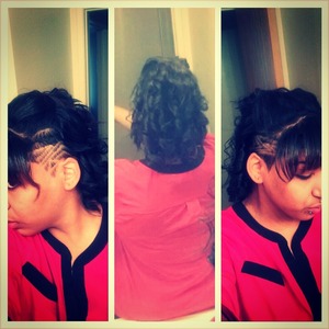 shaved sides with design and spiral curls