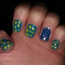 Blue with lime green polka dots and glittery accent nail