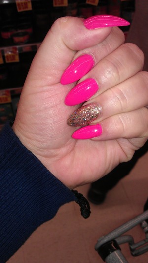 hot pink with gold glitter nail polish.. 