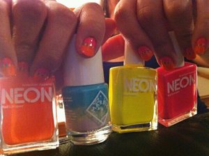 I Used American Apperel Nail Polish in
Neon Coral,Neon Yellow For Polka Dot,Neon Pink..
And The Turquoise Polka Dots Are From The Marble Nail Polish From Urban Outfitters! Finish Off With Top Coat I Used Rush High Speed Top Coat!