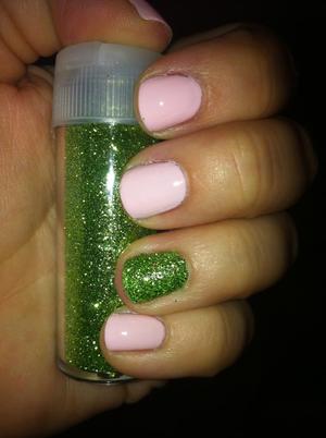 I used Julep's Courteney on my ring finger and topped it with an Extra Fine Craft glitter in the color "pesto" and used Julep's Penelope on all the other nails.