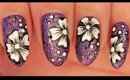 White Flowers on Glittery Purple nail art