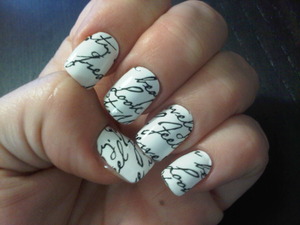 Sally Hansen nail stickers, super easy to put on but they don't completely fit. If I was in a rush I'd use them again.