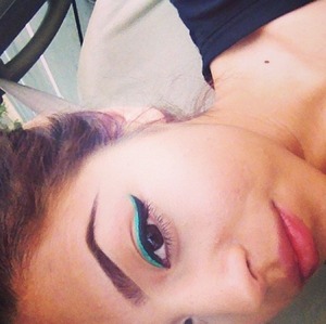 Turquoise and black eyeliner using wet and wild eyeliners  Follow me on Instagram @sussansotelo