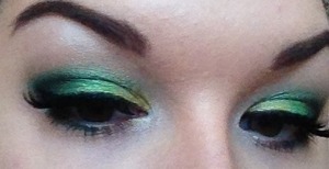 Nyx jumbo eye pencil in milk. brazen cosmetics shadow in Santa margarita. and then some pretty emeralds from my 88 shimmer coastal scents palette. blackout form UD in my outer v. physician's formula black liner and Ardell Demi whispie lashes. 