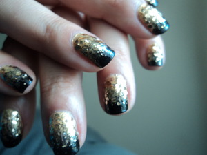 Gold glitter and black gradient. My favorite recent nail art actually. Wish this pic was in better focus tho. 