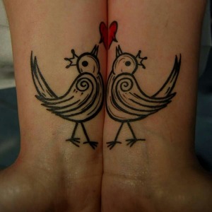 very cute for couples even a guy wouldnt be embaressed to have this tattoo I hope :):):)!!!!!
