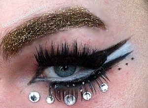 Hi! So for my first post I wanted to show a graphic liner look I did with minimal products and some rhinestones! 