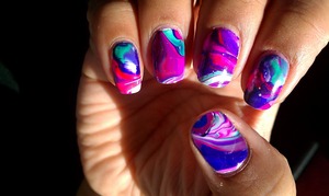 one of the most gorgeous color combos I've ever tried and it wasn't even my idea. my sister's friend came over to get her nails done (penguins) and chose these colors for my water marble. I love it!