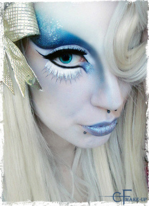 
Kicking off December with winter-themed make-up. The ice effect was nicely achieved with my new glitter palette.‎ 

Catherine Falcon Make-Up Artist: https://www.facebook.com/pages/Catherine-Falcon-Make-Up-Artist/485279978187724

Products I used:

Snazaroo White Face Paint
Kryolan Professional Make-up TV Paint Stick
180 Color Palette
e.l.f. Cosmetics Studio Cream Eyeliner
NYX Cosmetics Cream Glitterati Palette
Stargazer Lipstick 105 and 116
Radiant Cosmetics White Tone Corrector
