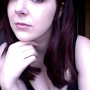 Slightly red, shorter, wavy hair!