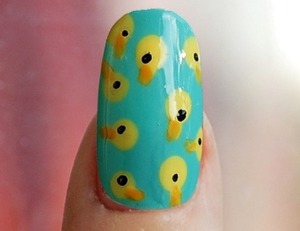 Duck Nails!. Here is a really easy idea of something as cute as Rubber ducks.
Feel like reading? http://cutesimplestuff.blogspot.mx/2013/07/rubber-duck-nails.html
Feel more like watching? http://www.youtube.com/watch?feature=player_embedded&v=DsZu94Fwd1s