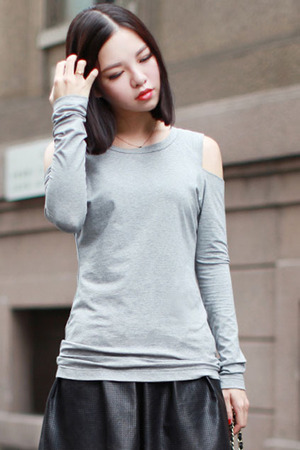 Grey blouse, featuring round neck, cut-out design over the shoulders, slim fit, soft touch fabric. Goes great with your black skirt and black short boots when attending your friend's party.