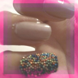 I mimicked this look by using nail glue and rolling it around in craft balls found at hobbie lobby:)