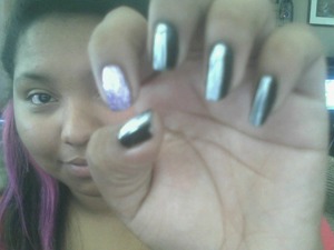Black nail polish, white crackle type nail polish and purple icing glitter nail polish ♥