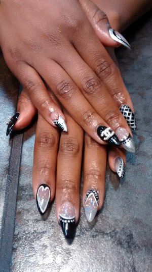 black Chanel themed nails by SauceC Nailz