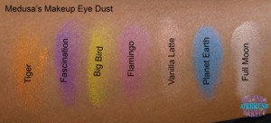 Medusa's Makeup Eye Dust swatches on medium tan / olive skin, available at http://www.OrlandoAirbrushMakeup.com, serving the Orlando and Miami markets.